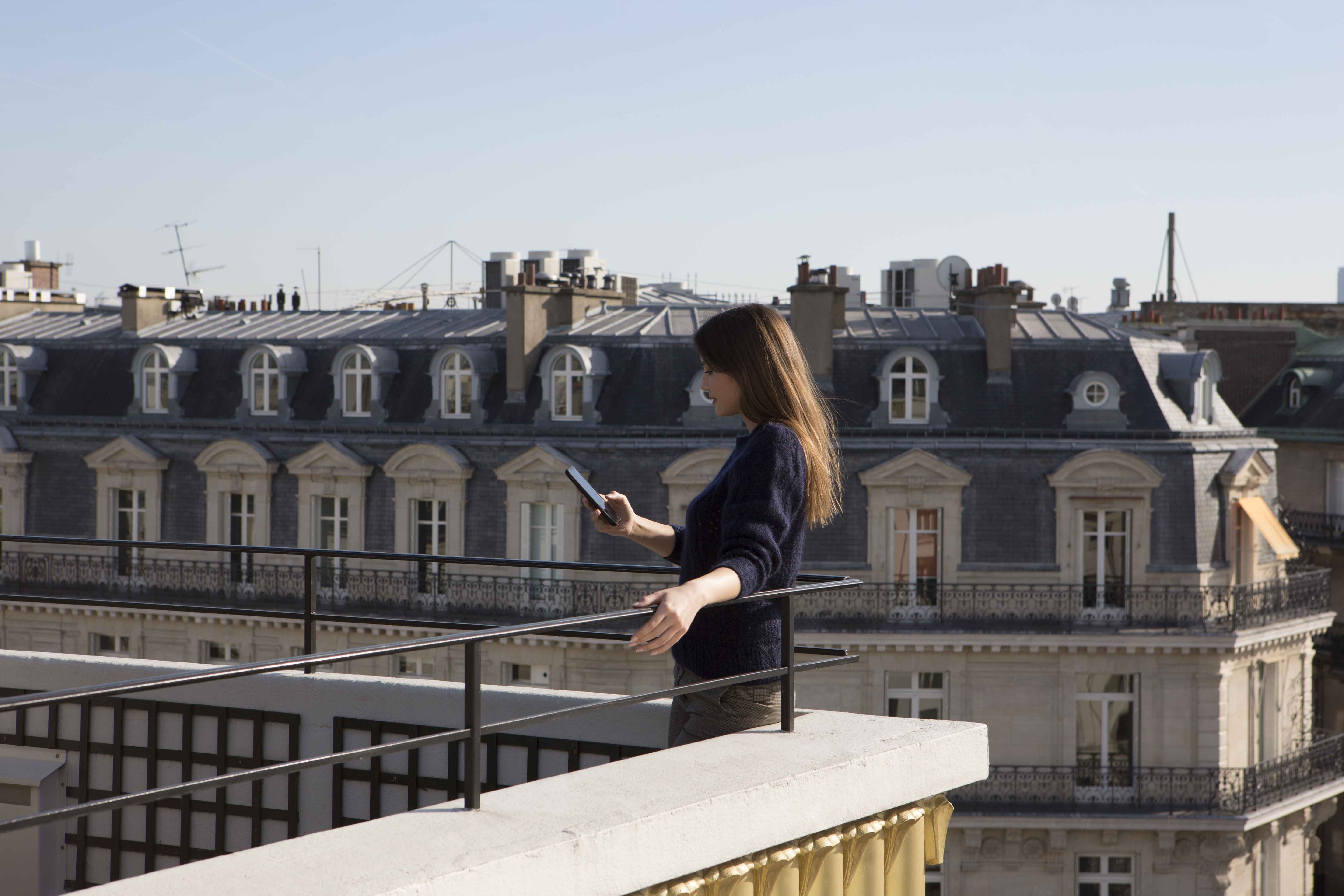 Girl on Paris's rooftop